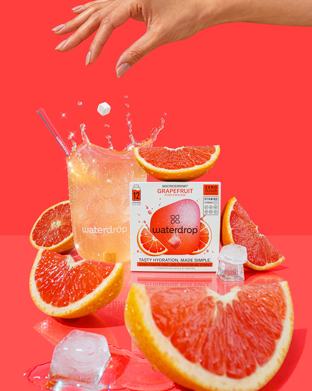 Set Basta Zucchero 4+1: Cubetti vitaminici al pompelmo con bicchiere d'acqua.