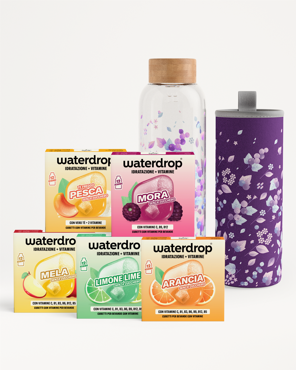 Scatola assortita Waterdrop gusti, bottiglia di vetro con tappo in legno e tumbler viola con motivo floreale.