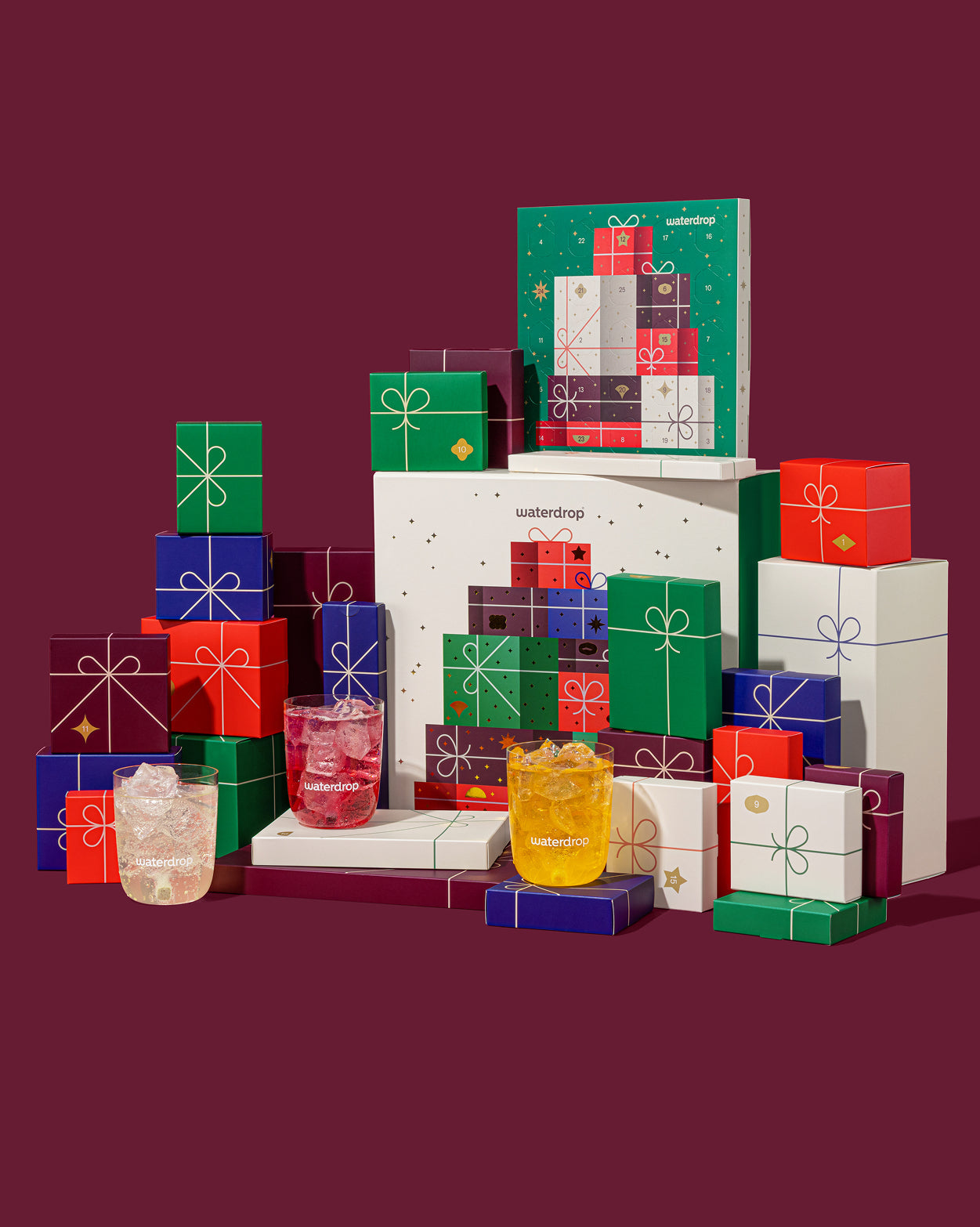 Set Calendario dell'Avvento waterdrop® con cubi regalo e bicchieri.