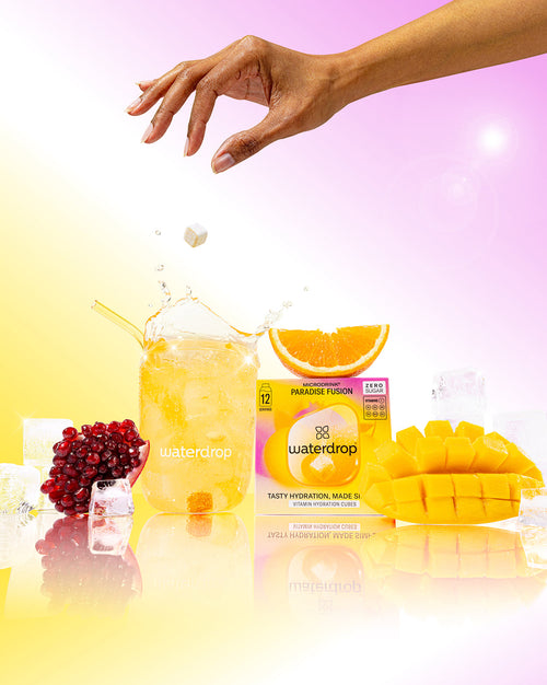 Cubo idratazione PARADISE FUSION con arancia e mango in acqua frizzante.
