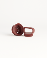 Close-up of a red bottle cap with a handle from the Choose your Goody collection by waterdrop®.