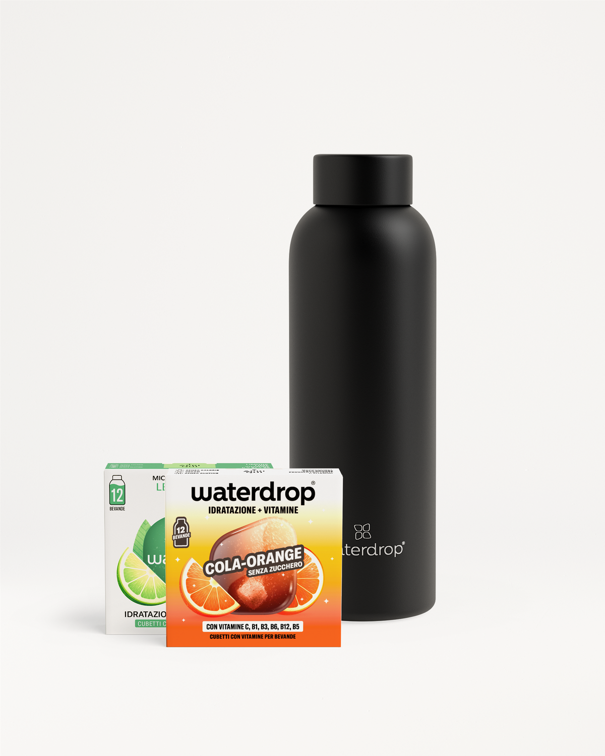Set Scoperta Frizzante: bottiglia nera e cubetti Cola-Arancia.