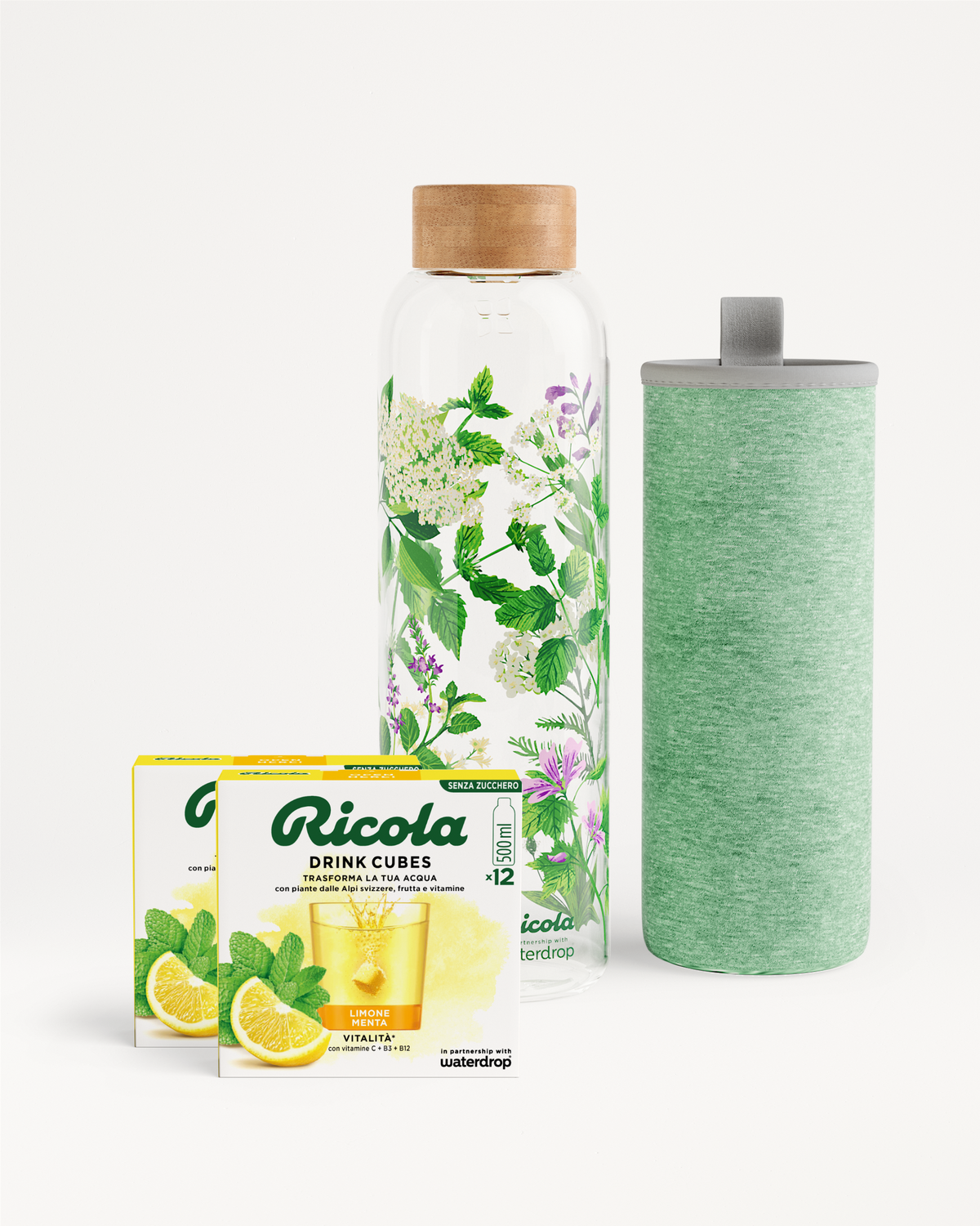 Set Bottiglia Ricola con bottiglia in vetro, sleeve e cubetti Ricola.