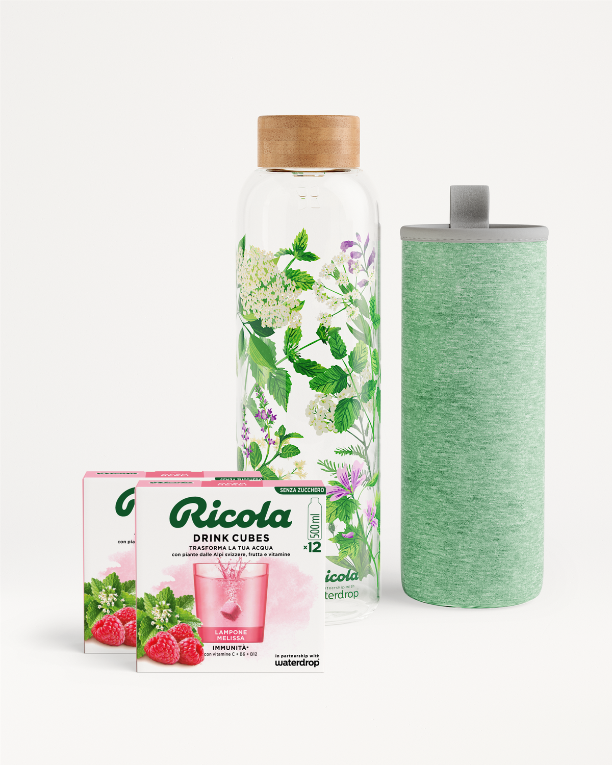 Set Bottiglia Ricola con cubetti idratanti e bottiglia in vetro.