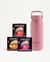 Confezione assortita di Waterdrop e una borraccia rosa riutilizzabile.