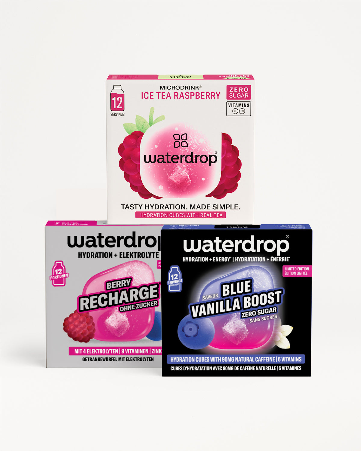 Tre confezioni Waterdrop per idratazione impilate a piramide, con design di confezione rosa, viola e blu.