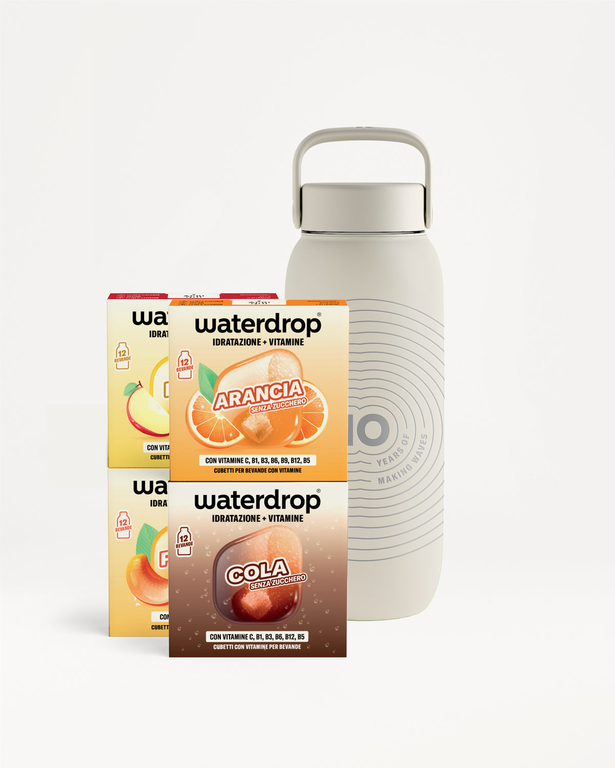 Light gray reusable bottle with a handle beside three small flavor sachets.