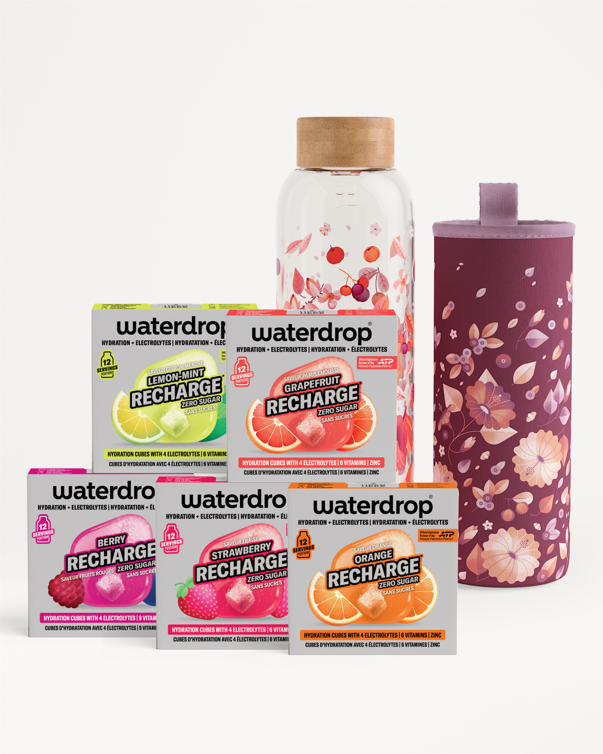 Mix di confezioni di ricarica gusto con una bottiglia trasparente e un tumbler viola con motivo floreale.